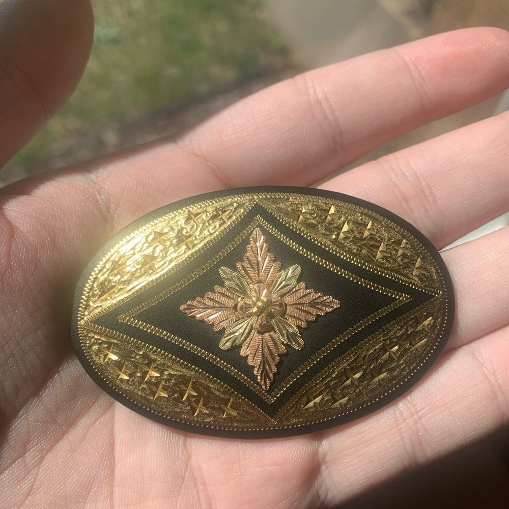 Black Hills Gold Lazy K 10K Gold Trim Oval Belt Buckle with Flower Pattern
